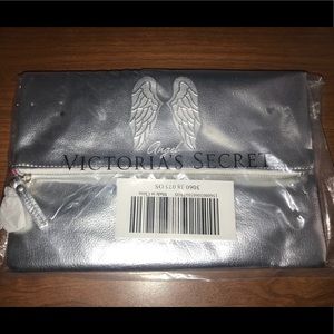 Victoria’s Secret Angel silver fold over clutch.